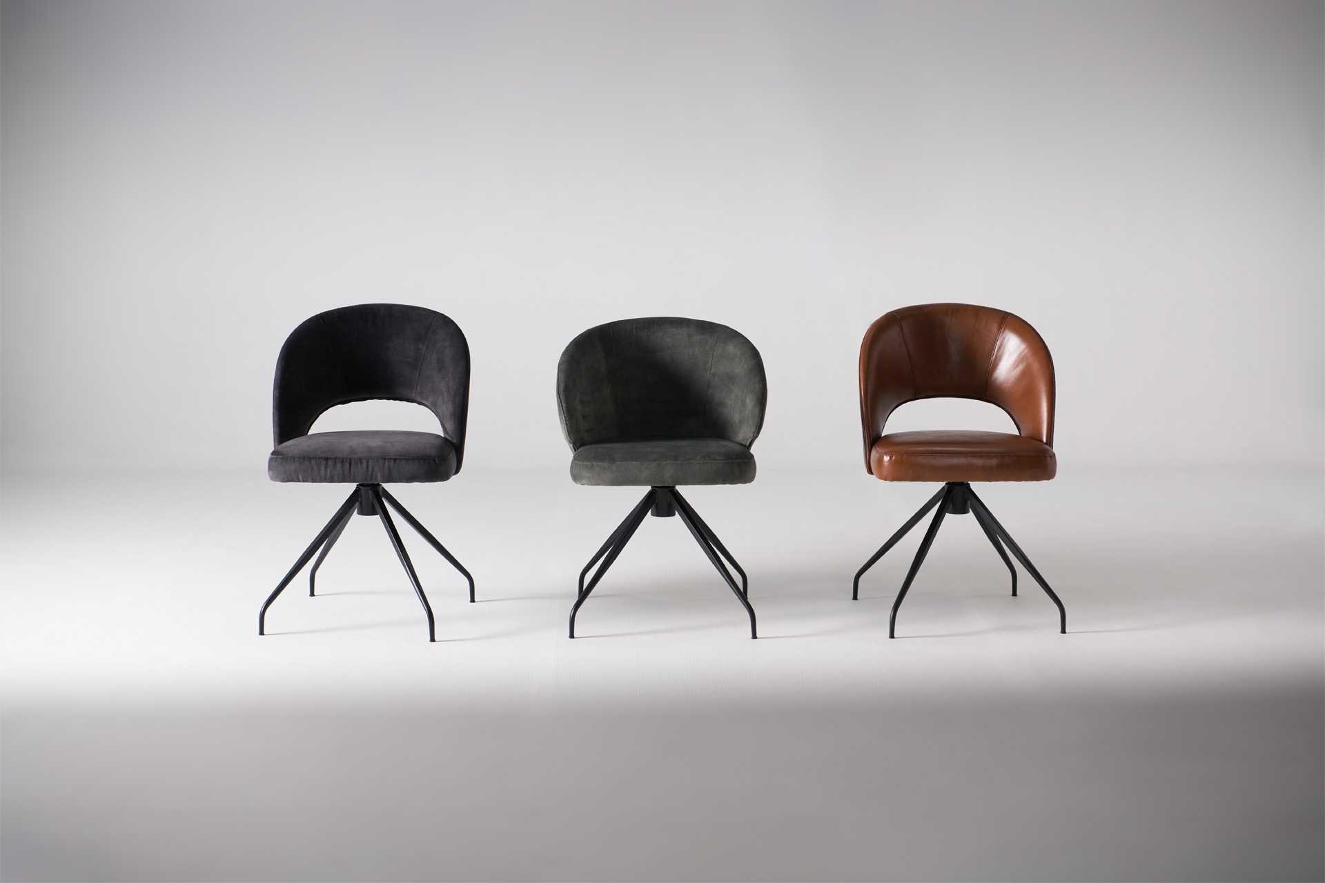 A lineup of modern design chairs.